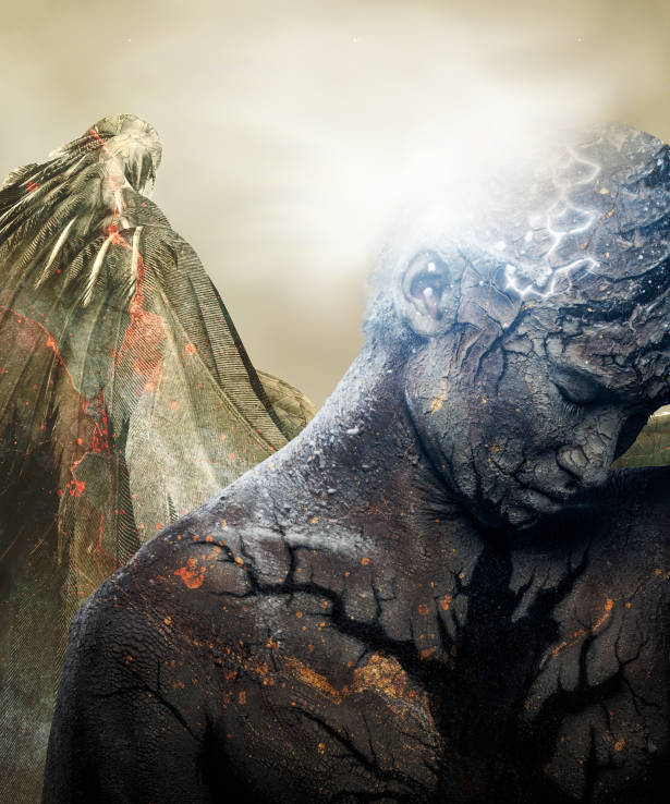 Figure with cracked stone‑like skin and glowing light emerging from the head.